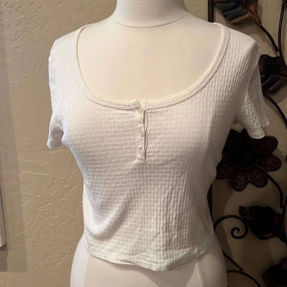 This cute white tee could be worn with literally anything!